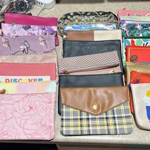 23 IPSY bags! Assorted and adorable